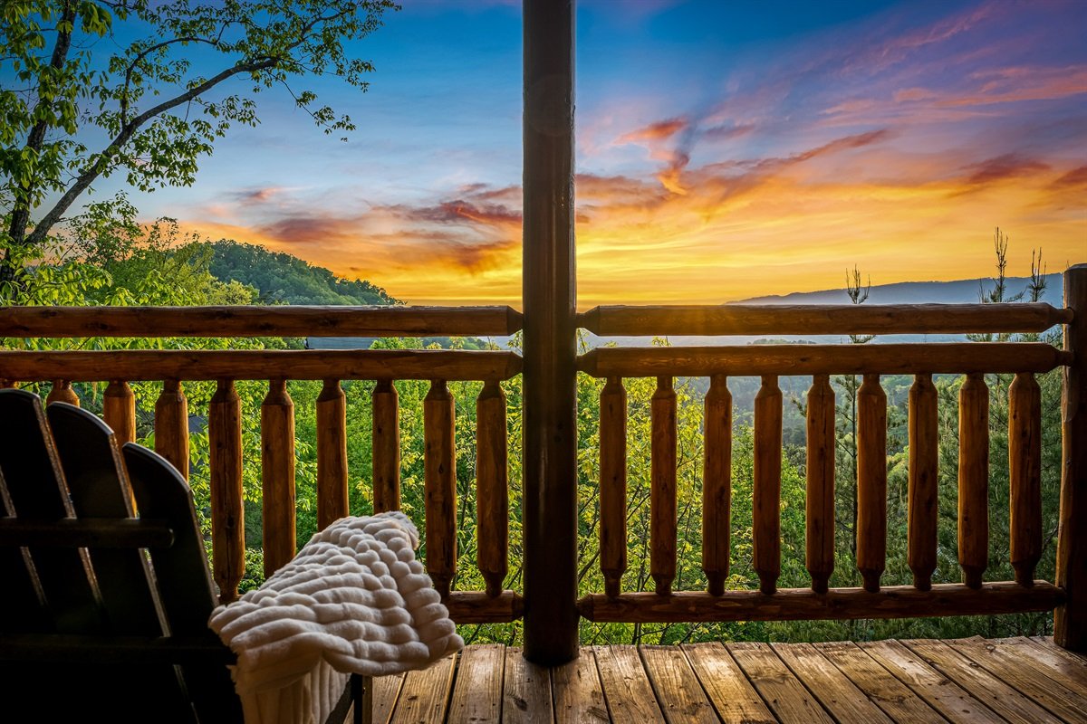 Cozy porch seating with breathtaking mountain views at Smoky Mountain Bearadise, sleeps 30